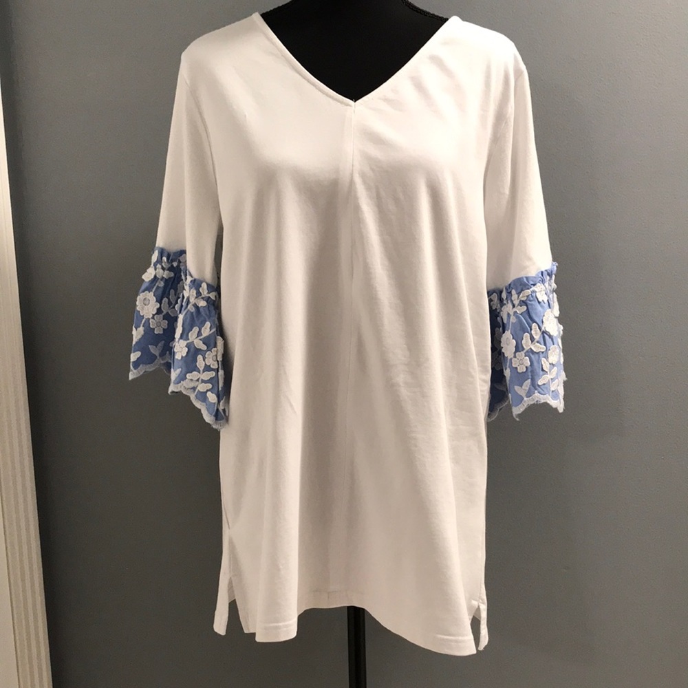 Marley Lilly white top with blue ruffled sleeves. Size M